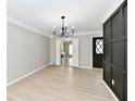 Bright room featuring new vinyl floors, and neutral paint at 1053 Millwood Ct # 3, Indianapolis, IN 46260