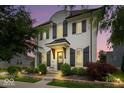 Charming two-story home with black shutters and professional landscaping at 1655 Avondale Dr, Westfield, IN 46074