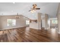 Spacious living room featuring high ceilings, hardwood floors, and an abundance of natural light at 16956 Fulton Pl, Westfield, IN 46074