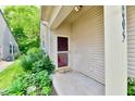 View of a cozy front porch with a storm door and a welcome mat at 2805 Rylee Ct, Greenwood, IN 46143