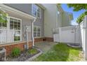 A small backyard with a short fence and a small grass area at 603 Daviess Dr, Westfield, IN 46074