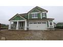Exterior view of a two story home with white trim and a two car garage at 4055 Bozeman Way, Bargersville, IN 46106