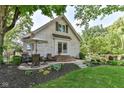 Spacious backyard patio with elegant seating, perfect for outdoor entertaining at 5681 Carrollton Ave, Indianapolis, IN 46220