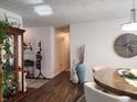 Dining room featuring hard wood floors, modern decor, and neutral paint at 7870 E County Road 150 S, Avon, IN 46123