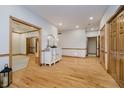 Spacious living room features hardwood floors, white trim, and ample natural light at 815 Copperfield Ln, Danville, IN 46122