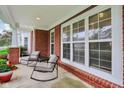 Inviting porch with seating, offering a cozy spot to relax and enjoy the neighborhood views at 15528 Bowie Dr, Westfield, IN 46074