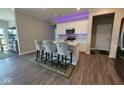 Modern kitchen featuring an island with seating and stainless steel appliances at 17255 Seaboard Pl, Noblesville, IN 46060