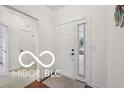 Bright entryway with tiled floors and white trim at 19146 Carol Cove Cir, Noblesville, IN 46062