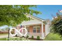 Inviting exterior view of a home with a cozy porch and American flag at 19146 Carol Cove Cir, Noblesville, IN 46062