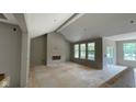 Spacious living room with fireplace, large windows providing great light at 1960 Delp Ct, Avon, IN 46123