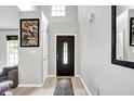 Bright foyer featuring hardwood floors, high ceilings, and decorative accents at 1264 Black Oak Dr, Greenwood, IN 46143