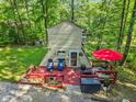 Charming A-frame home with a spacious deck, offering a serene retreat in a natural setting at 1413 N Lost Lake Rd, Columbus, IN 47201