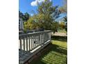 Cozy wooden deck with a grill, perfect for outdoor entertaining and enjoying the backyard view at 3682 Lace Bark Dr, Indianapolis, IN 46235