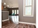 Open-concept living area featuring vinyl flooring and lots of natural light at 1635 N College Ave # 4, Indianapolis, IN 46202