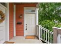 Welcoming front door with stylish address display and classic hardware at 2326 N Pennsylvania St # 6, Indianapolis, IN 46205