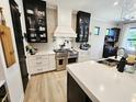 This kitchen showcases stainless appliances, modern cabinets, and a quartz countertop island at 5686 Ellie Ct, Noblesville, IN 46062