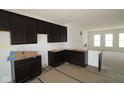 New kitchen featuring dark wood cabinets at 7063 Pate Hollow Dr, Brownsburg, IN 46112