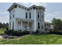 Beautiful two-story home with stone accents and well-manicured landscaping at 115 W State Road 38, Pendleton, IN 46064