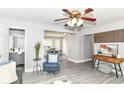 Open-concept living room and dining area with modern finishes, stylish furnishings, and great natural light at 1820 Hemlock Ln, Plainfield, IN 46168
