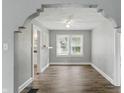 Dining room featuring sleek flooring, bright walls, and arched entry at 1915 Albany St, Beech Grove, IN 46107