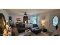 Bright living room with a comfortable sectional sofa and a view of the outside at 3039 28Th St, Columbus, IN 47203