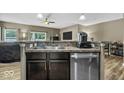 Modern kitchen with stainless steel appliances and granite countertops, ideal for culinary enthusiasts at 4736 Blue Marlin Way, Indianapolis, IN 46239