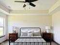 Cozy bedroom featuring a tray ceiling, neutral walls, and well-coordinated furniture at 0 Goat Hollow Lot 4, Martinsville, IN 46151