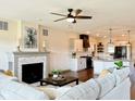 Bright living space with a fireplace, modern decor, and an open view into the kitchen area at 0 Goat Hollow Lot 4, Martinsville, IN 46151