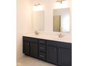 Bathroom featuring a double sink vanity with a dark finish and modern fixtures at 0 Whitetail Ridge Lot 3, Mooresville, IN 46158
