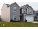Stylish two-story home featuring a two-car garage, well-kept lawn, and modern siding at 1375 Crabapple Rd, Franklin, IN 46131