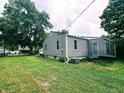 Spacious backyard with lush greenery and a well-maintained lawn, perfect for Gathering gatherings at 196 Bakemeyer St, Indianapolis, IN 46225