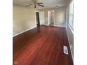 Inviting living room with hardwood floors, neutral paint and views into adjacent rooms at 2180 N Irwin St, Indianapolis, IN 46219