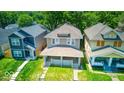 Aerial shot of a charming neighborhood with lush green trees and well-maintained homes at 420 Eastern Ave, Indianapolis, IN 46201