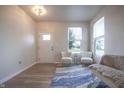 Inviting living area with lots of natural light, neutral colors, and modern decor at 2101 Shadow Fox Dr, Columbus, IN 47201
