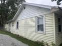 A single-Gathering home with light-colored siding and a well-maintained exterior at 4521 Vernon Ave, Indianapolis, IN 46226