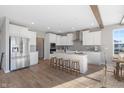 Modern kitchen featuring white cabinets, stainless steel appliances, and a large island at 4995 S 650 W, Jamestown, IN 46147