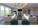 Bright and airy living room with large windows and a decorative fireplace at 4995 S 650 W, Jamestown, IN 46147