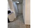 Tiled hallway leads from the kitchen to an outside door at 6368 Titania Dr, Indianapolis, IN 46236