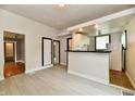 Bright living space boasting modern flooring and an open flow to adjacent rooms at 706 University Blvd, Anderson, IN 46012