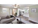 Open floor plan featuring a living room and kitchen with stainless appliances at 9378 N County Road 75 W, Lizton, IN 46149