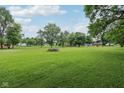 Expansive green lawn, perfect for recreation and outdoor activities at 9974 N 850 W, Fairland, IN 46126