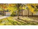 Inviting one-story home with mature trees and manicured lawn, offering great curb appeal at 5303 Windridge Dr # 172, Indianapolis, IN 46226
