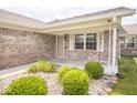 Inviting front entrance with charming landscaping and a covered porch at 7687 Sea Crest N Way, Noblesville, IN 46062