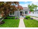 Charming home with a welcoming front porch and well-maintained landscaped lawn at 188 Maple Ln, Franklin, IN 46131