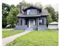 Charming gray two-story home with a well-maintained lawn and front walkway at 2720 S Taft Ave, Indianapolis, IN 46241