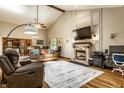 Spacious living room featuring a fireplace, comfortable seating, and an open floor plan at 289 Sandbrook Dr, Noblesville, IN 46062