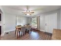 Cozy dining area with hardwood floors and a table set for four at 311 S 6Th Ave, Beech Grove, IN 46107