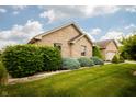 Well maintained lawn and landscaping surround this beautiful brick home at 3717 Bellmore Dr, Brownsburg, IN 46112