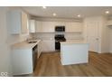 Modern kitchen featuring stainless appliances, bright countertops, and an island at 3917 Highcrest Rd, Indianapolis, IN 46239
