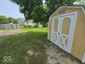 Exterior shot of backyard shed with double doors for ample storage at 5825 Sapelo Dr, Indianapolis, IN 46237